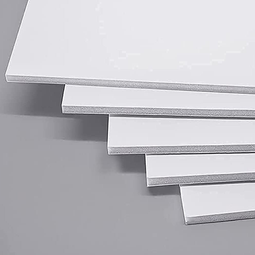 Stack of white foam sheets on a gray background
